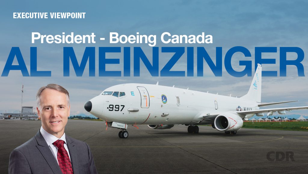 Portrait of Al Meinzinger President - Boeing Canada and plane in background