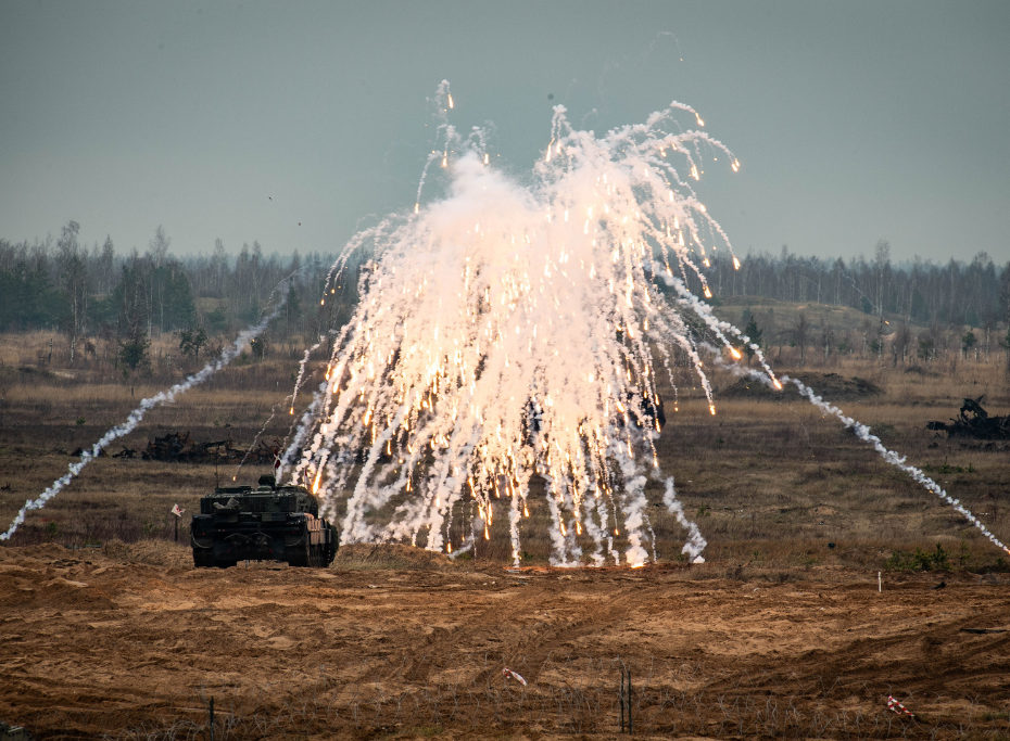 Military truck in field, explosion, NATO MNB-LVA