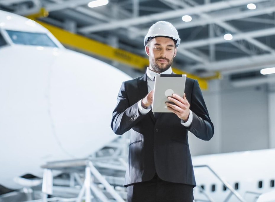 SkyAlyne Selects CGI, man in front of plane